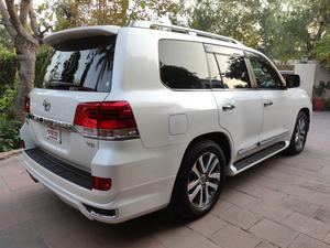 LandCruiser ZX ( V8 )  full house 
Model 2018/11 production 
Import 2023 unregistered 
Not a 100 km driven in Pakistan 
Mileage 28000 km
Pearl white metallic with brono leather interior 
4.5 AA as per auction sheet 
Brand new condition ( bumper to bumper original & spotless)
Top of line specs. 
Rear entertainment 
Cool box 
Wireless charger 
Original body kit 
Adapted Radar 
Further information please call & visit Victory Cars jail road Lahore