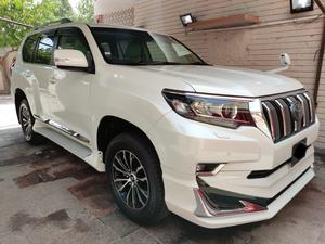 Toyota Prado TXL 2700cc
Model 2021 fresh import 2024
Unregistered 
5AA auction sheet
Pearl white with beige leather interior 
7 seater with sunroof 
Full body kit 
Further information please call & visit at Victory Cars jail road Lahore.