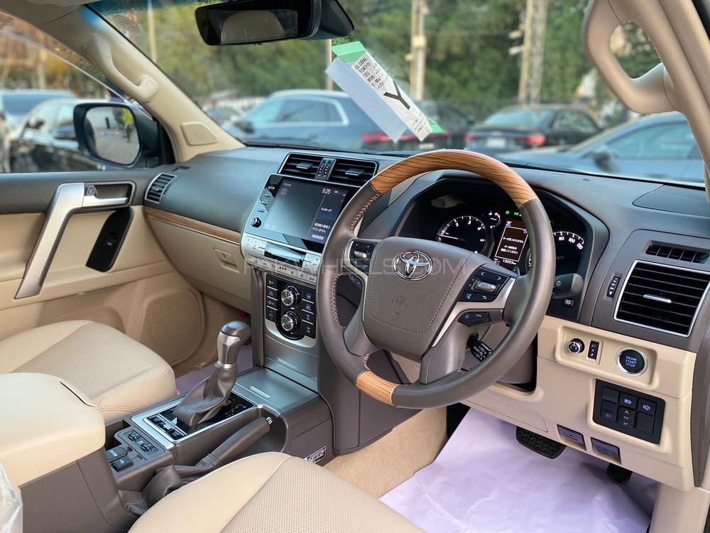 Prado TZ.G 2.8 Diesel 
Model: 2020
Mileage: 15,000 km
Unregistered 
Fresh Import

*Wooden Steering
*Height control
*Leather & power seats
*Heating & cooling seat
*Cool box
*Orignal TV + 4 cameras
*Headlight washer
*Paddle shifters 
*Memory seats
*4x4 System
*Multi terrain system (MTS)
*Crawl control
*Traction control
*Ambient lighting
*Sunroof
*7 seater

Calling and Visiting Hours

Monday to Saturday 

11:00 AM to 7:00 PM