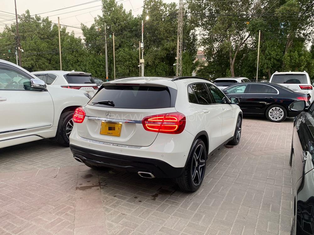 Mercedes GLA 200 AMG
Model: 2015
Mileage: 9,000 Km
Reg: 2015 Khi

Top of the line:
*Panoramic Roof
*Bucket leather seats
*Memory package 
*Privacy tint 
*Sports suspension 
*Leather dashboard