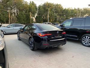 BMW i4 eDrive35 M Sport  
Model: 2022
Mileage: 1,500 km 
unregistered 
Fresh Import 2025

*Alcantara with Blue Contrast Stitching seats 
*BMW heads-up display 
*BMW iconic sound electric 
*Digital curve led display 
*LED headlamps
*Apple carplay
*Driving modes
*Parking assistant plus
*Panorama view
*Active cruise control with stop and go function
*Lane assistant
*Speed limiter
*Electric memory seats 
and many more options

Calling and Visiting Hours

Monday to Saturday

11:00 AM to 7:00 PM