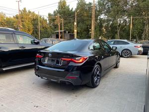 BMW i4 eDrive35 M Sport  
Model: 2022
Mileage: 1,500 km 
unregistered 
Fresh Import 2025

*Alcantara with Blue Contrast Stitching seats 
*BMW heads-up display 
*BMW iconic sound electric 
*Digital curve led display 
*LED headlamps
*Apple carplay
*Driving modes
*Parking assistant plus
*Panorama view
*Active cruise control with stop and go function
*Lane assistant
*Speed limiter
*Electric memory seats 
and many more options

Calling and Visiting Hours

Monday to Saturday

11:00 AM to 7:00 PM