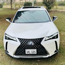 Lexus UX300e ( EV ) ultra luxury plus takumi package 
Model 2021/11 production fresh import 2024 from Japan.
Brand new vehicle ( spotless condition )
Pearl diamond metallic white with brono nappa leather interior.
Mileage 3000 km
Auction grade: 5AA
Battery range 375 km
Top of the Line specs.
All wheel drive ( AWD )
All seat heated & ventilated air conditioned 
Heated steering wheel 
Electric telescope steering wheel 
Memory & multi power electric seats 
Head up display 
Blind spot monitor ( BSM )
Lane  assistance 
3 mode driving modes
Lambs support 
Voice activation assistance 
Glass electric Sunroof 
Wireless charger 
Mark luvinson surround sound entertainment system with 15 speakers 
Privacy glass 
Power boot
Google maps & Apple CarPlay 
Adapted cruise control 
Adapted Radar
Airmatic electric sports suspension 
Parktronic sensors all sides
Auto pilot 
7 cameras 360 degrees 
18 “ Lexus note black Crome L sport alloy wheels.
Adapted auto laser active led headlamps 
11 kw charger