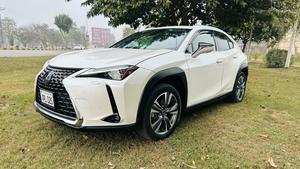 Lexus UX300e ( EV ) ultra luxury plus takumi package 
Model 2021/11 production fresh import 2024 from Japan.
Brand new vehicle ( spotless condition )
Pearl diamond metallic white with brono nappa leather interior.
Mileage 3000 km
Auction grade: 5AA
Battery range 375 km
Top of the Line specs.
All wheel drive ( AWD )
All seat heated & ventilated air conditioned 
Heated steering wheel 
Electric telescope steering wheel 
Memory & multi power electric seats 
Head up display 
Blind spot monitor ( BSM )
Lane  assistance 
3 mode driving modes
Lambs support 
Voice activation assistance 
Glass electric Sunroof 
Wireless charger 
Mark luvinson surround sound entertainment system with 15 speakers 
Privacy glass 
Power boot
Google maps & Apple CarPlay 
Adapted cruise control 
Adapted Radar
Airmatic electric sports suspension 
Parktronic sensors all sides
Auto pilot 
7 cameras 360 degrees 
18 “ Lexus note black Crome L sport alloy wheels.
Adapted auto laser active led headlamps 
11 kw charger