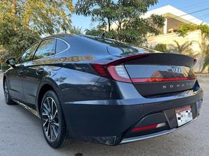 HYUNDAI SONATA 2.0 (2000cc)
Model 2021 || Registered 2021
Oxford Blue Color 
Bumper to Bumper Original 100% Guaranteed 
18,000km driven 
Panoramic Roof
Wireless Charger
Dual Power Seats
Harmon kardon speakers
All seals still intact 
READY DELIVERY 
EXCHANGE POSSIBLE WITH ANY CAR

For inspection
Available at SUPREME CARS
Plot # 151/F,Under Imam heights,Shop no.1&2, Main Khalid Bin Walid Rd, Karachi, Sindh 75400

|  Premium Cars  |  Best Prices  |  Optimum Performance | 
#Supremecarsgang