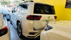 LandCruiser ZX lc300 , model 2023 fresh import 2025 February, top of the line specs.
Aution grade 6AA, JBL cool box full body kit & rear entertainment 
Further information please contact & visit at Victory Cars jail road Lahore