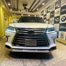 Lexus LX570 (ultra sports utility package)
Model 2019 fresh import 2025
Unregistered 
Diamond White metallic with orinzo bronze nappa leather interior 
Brand new condition ( spotless )
Mileage 22000 km 
Auction grade 5 AA
Top of the line specs ( full house )
Original body kitted 
Further information please call & visit at Victory Cars jail road Lahore.