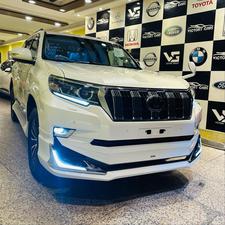 Toyota LandCruiser Prado TX-L 
Mode 2019 fresh import ( unregistered)
Mileage 33000 km
Pearl white with beige leather interior 
Brand new condition ( spotless)
Auction grade 4.5
7 seater with sunroof 
Top of line specs.
Nappa leather multi power seats with heated & ventilated ( air conditioning)
B/o premium entertainment sound system.
Multi cameras 
Customised fitting 
Crome package 
8 zone climate control air conditioning system 
Adapted active Radar 
Line accessed 
Adapted cruise control system 
All zone parktronic sensors 
Full body kit
18” alloy wheels with new tyres.
Further information please call & visit at Victory Cars jail road Lahore.