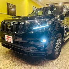 Toyota LandCruiser Prado TXL 2700cc eco/pro.
Model 2020 import April 2025
Brand New vehicle ( spotless condition )
Mileage 49000 km
Auction grade 4.5 A 
Silky black with ash white interior 
Top of the line specs,
All 7seats nappa leather 
Heated & ventilated ( air conditioning) seat 
Glass electric sunroof 
All zone climate control air conditioning 
Adapted Radar 
Active line accessed & blind spot monitor.
Adaptive cruise control 
Premium sound system with 16 speakers 
Cool box 
Full trd original body kit 
19” alloy wheels 
Crome package 
Further information please call & visit at Victory Cars jail road Lahore