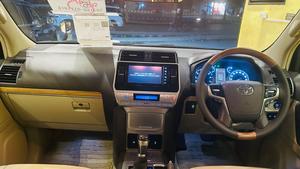 Toyota LandCruiser Prado TXL 2700cc eco/pro.
Model 2020 import April 2025
Brand New vehicle ( spotless condition )
Mileage 49000 km
Auction grade 4.5 A 
Silky black with ash white interior 
Top of the line specs,
All 7seats nappa leather 
Heated & ventilated ( air conditioning) seat 
Glass electric sunroof 
All zone climate control air conditioning 
Adapted Radar 
Active line accessed & blind spot monitor.
Adaptive cruise control 
Premium sound system with 16 speakers 
Cool box 
Full trd original body kit 
19” alloy wheels 
Crome package 
Further information please call & visit at Victory Cars jail road Lahore