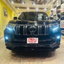 Toyota LandCruiser Prado TXL 2700cc eco/pro.
Model 2020 import April 2025
Brand New vehicle ( spotless condition )
Mileage 49000 km
Auction grade 4.5 A 
Silky black with ash white interior 
Top of the line specs,
All 7seats nappa leather 
Heated & ventilated ( air conditioning) seat 
Glass electric sunroof 
All zone climate control air conditioning 
Adapted Radar 
Active line accessed & blind spot monitor.
Adaptive cruise control 
Premium sound system with 16 speakers 
Cool box 
Full trd original body kit 
19” alloy wheels 
Crome package 
Further information please call & visit at Victory Cars jail road Lahore