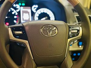 Toyota LandCruiser Prado TXL 2700cc eco/pro.
Model 2020 import April 2025
Brand New vehicle ( spotless condition )
Mileage 49000 km
Auction grade 4.5 A 
Silky black with ash white interior 
Top of the line specs,
All 7seats nappa leather 
Heated & ventilated ( air conditioning) seat 
Glass electric sunroof 
All zone climate control air conditioning 
Adapted Radar 
Active line accessed & blind spot monitor.
Adaptive cruise control 
Premium sound system with 16 speakers 
Cool box 
Full trd original body kit 
19” alloy wheels 
Crome package 
Further information please call & visit at Victory Cars jail road Lahore
