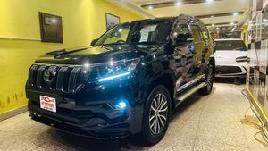 Toyota LandCruiser Prado TXL 2700cc eco/pro.
Model 2020 import April 2025
Brand New vehicle ( spotless condition )
Mileage 49000 km
Auction grade 4.5 A 
Silky black with ash white interior 
Top of the line specs,
All 7seats nappa leather 
Heated & ventilated ( air conditioning) seat 
Glass electric sunroof 
All zone climate control air conditioning 
Adapted Radar 
Active line accessed & blind spot monitor.
Adaptive cruise control 
Premium sound system with 16 speakers 
Cool box 
Full trd original body kit 
19” alloy wheels 
Crome package 
Further information please call & visit at Victory Cars jail road Lahore