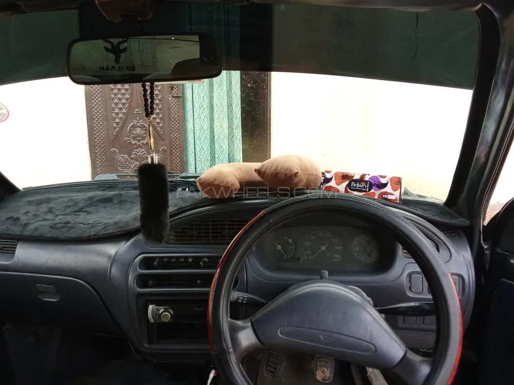 Daihatsu Cuore 2004 for Sale in Faisalabad Image-1
