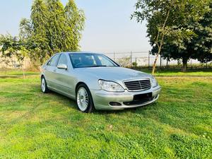 Mercedes-Benz S350 3700cc V6
Model 2004 ( production 2003/12 )
Import from Japan 2007 registered 2010 in Islamabad 
First owner driven 
Mileage  72000
Excellent condition ( original paint & spotless)
Metallic silver colour & black nappa leather interior.
Top of the line specs.
Sunroof, multi power seats, heated seats, massager seats, electric curtains, aromatic suspension, Xinon headlights, electric boot, cool box , premium sound system. Duel climate control air conditioning.
Further information please call & visit at Victory Cars jail road Lahore