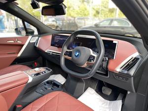 BMW iX Xdrive 50
Model: 2023
Mileage: 3,800 km
Un-Registered 
Japan Import

One & Only with 
530 Hp & 550 km Range

Black sapphire Metallic Colour 
with Tan Interior

*Wireless Apple carplay and android auto
*LED headlights 
*Ambient lights
*Four-zone climate control
*Comfort Access keyless entry 
*Bowers and wilkins sound System
*14.9-inch touchscreen infotainment system
*Active steering
*Soft closing doors
*BMW Natural Interaction voice assistant
*22-inch alloy wheels
*Front massage seats
*Panoramic glass roof sky lounge with electrochromatic shade function

Calling and Visiting Hours

Monday to Saturday

11:00 AM to 7:00 PM