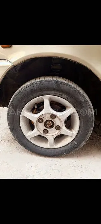 Daihatsu Cuore 2004 for Sale in Faisalabad Image-1