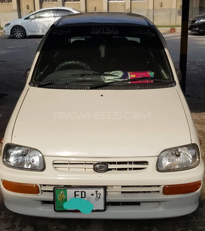 Daihatsu Cuore 2012 for Sale in Faisalabad Image-1