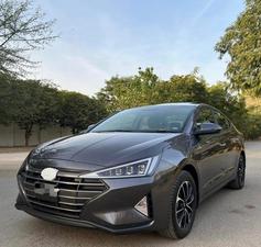 HYUNDAI ELANTRA GLS TOP OF THE LINE NEW RIMS (2000cc)
Model 2021 December || Registered 2022
Only 25,300 KM 100% Genuine 
Hyundai South Maintained 
Cyber Grey Color 
Bumper to bumper original guaranteed 100 %
TOP OF THE LINE
Original NEW TV Back Cam
Original NEW Leather Seats
Original NEW RIMS
Sunroof 
Wireless Charger
Dual Power Seats
Spare Wheel Unused 
Fog lights
Just Like Zero Meter 
All seals still intact 
See to Believe 
Ready Delivery 
EXCHANGE POSSIBLE WITH ANY CAR

For inspection
Available at SUPREME CARS
Plot # 151/F,Under Imam heights,Shop no.1&2, Main Khalid Bin Walid Rd, Karachi, Sindh 75400

|  Premium Cars  |  Best Prices  |  Optimum Performance | 
#supremecarsgang