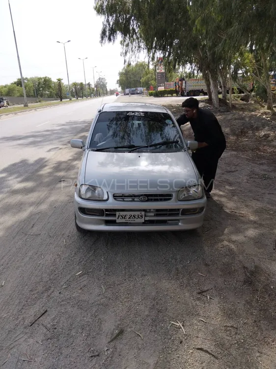 Daihatsu Cuore 2004 for Sale in Faisalabad Image-1