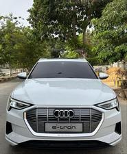 AUDI ETRON 50 QUATTRO TOP OF THE LINE (230KW)
Model 2022 || Registration 2022 
Choice Registered *800*
10,000 miles Driven 
Audi Maintained 
White Color
Bruno Interior
Bumper to Bumper Original Paint 100%
Scratch-less & Spotless
FULL HOUSE 
Just as good as Brand New   
Original TV 
Original Rims 
Still Smells like zero meter 
SEE TO BELIEVE 
READY DELIVERY 
EXCHANGE POSSIBLE WITH ANY CAR

For inspection
Available at SUPREME CARS
Plot # 151/F,Under Imam heights,Shop no.1&2, Main Khalid Bin Walid Rd, Karachi, Sindh 75400

|  Premium Cars |  Best Prices |  Optimum Performance | 
#supremecarsgang