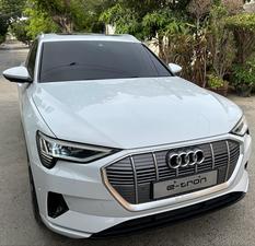 AUDI ETRON 50 QUATTRO TOP OF THE LINE (230KW)
Model 2022 || Registration 2022 
Choice Registered *800*
10,000 miles Driven 
Audi Maintained 
White Color
Bruno Interior
Bumper to Bumper Original Paint 100%
Scratch-less & Spotless
FULL HOUSE 
Just as good as Brand New   
Original TV 
Original Rims 
Still Smells like zero meter 
SEE TO BELIEVE 
READY DELIVERY 
EXCHANGE POSSIBLE WITH ANY CAR

For inspection
Available at SUPREME CARS
Plot # 151/F,Under Imam heights,Shop no.1&2, Main Khalid Bin Walid Rd, Karachi, Sindh 75400

|  Premium Cars |  Best Prices |  Optimum Performance | 
#supremecarsgang