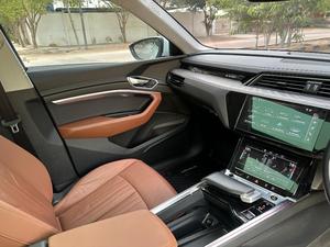AUDI ETRON 50 QUATTRO TOP OF THE LINE (230KW)
Model 2022 || Registration 2022 
Choice Registered *800*
10,000 miles Driven 
Audi Maintained 
White Color
Bruno Interior
Bumper to Bumper Original Paint 100%
Scratch-less & Spotless
FULL HOUSE 
Just as good as Brand New   
Original TV 
Original Rims 
Still Smells like zero meter 
SEE TO BELIEVE 
READY DELIVERY 
EXCHANGE POSSIBLE WITH ANY CAR

For inspection
Available at SUPREME CARS
Plot # 151/F,Under Imam heights,Shop no.1&2, Main Khalid Bin Walid Rd, Karachi, Sindh 75400

|  Premium Cars |  Best Prices |  Optimum Performance | 
#supremecarsgang