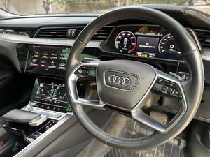 AUDI ETRON 50 QUATTRO TOP OF THE LINE (230KW)
Model 2022 || Registration 2022 
Choice Registered *800*
10,000 miles Driven 
Audi Maintained 
White Color
Bruno Interior
Bumper to Bumper Original Paint 100%
Scratch-less & Spotless
FULL HOUSE 
Just as good as Brand New   
Original TV 
Original Rims 
Still Smells like zero meter 
SEE TO BELIEVE 
READY DELIVERY 
EXCHANGE POSSIBLE WITH ANY CAR

For inspection
Available at SUPREME CARS
Plot # 151/F,Under Imam heights,Shop no.1&2, Main Khalid Bin Walid Rd, Karachi, Sindh 75400

|  Premium Cars |  Best Prices |  Optimum Performance | 
#supremecarsgang