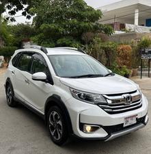 HONDA BRV S PACKAGE TOP OF THE LINE NEW SHAPE PUSH START LIMITED EDITION(1500cc)
Model 2020 || Registered 2020
Only Genuine 28,000 KM
Taffeta White Color
Bumper to Bumper Original 100%
Guaranteed 
Scratch-less Spotless  
Push start
Centre console/ Hand-rest
Automatic Transmission
Original TV NAV
Climate Control
New Grill 
Original Fog Lights
Genuine Rims
Just like Zero Meter
All Seals Still Intact 
EXCHANGE POSSIBLE WITH ANY CAR

For inspection
Available at SUPREME CARS
Plot # 151/F,Under Imam heights,Shop no.1&2, Main Khalid Bin Walid Rd, Karachi, Sindh 75400

|  Premium Cars  |  Best Prices  |  Optimum Performance | 
#supremecarsgang