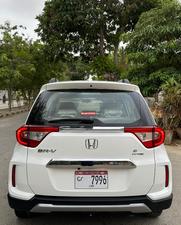 HONDA BRV S PACKAGE TOP OF THE LINE NEW SHAPE PUSH START LIMITED EDITION(1500cc)
Model 2020 || Registered 2020
Only Genuine 28,000 KM
Taffeta White Color
Bumper to Bumper Original 100%
Guaranteed 
Scratch-less Spotless  
Push start
Centre console/ Hand-rest
Automatic Transmission
Original TV NAV
Climate Control
New Grill 
Original Fog Lights
Genuine Rims
Just like Zero Meter
All Seals Still Intact 
EXCHANGE POSSIBLE WITH ANY CAR

For inspection
Available at SUPREME CARS
Plot # 151/F,Under Imam heights,Shop no.1&2, Main Khalid Bin Walid Rd, Karachi, Sindh 75400

|  Premium Cars  |  Best Prices  |  Optimum Performance | 
#supremecarsgang