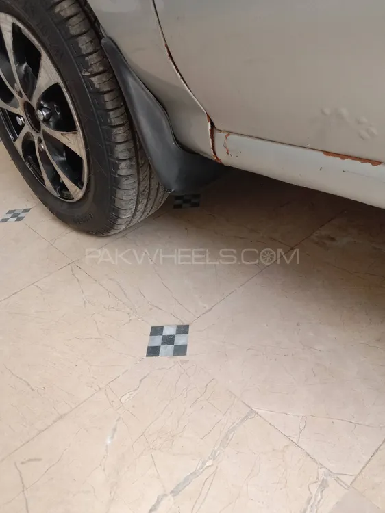 Daihatsu Cuore 2007 for Sale in Faisalabad Image-1