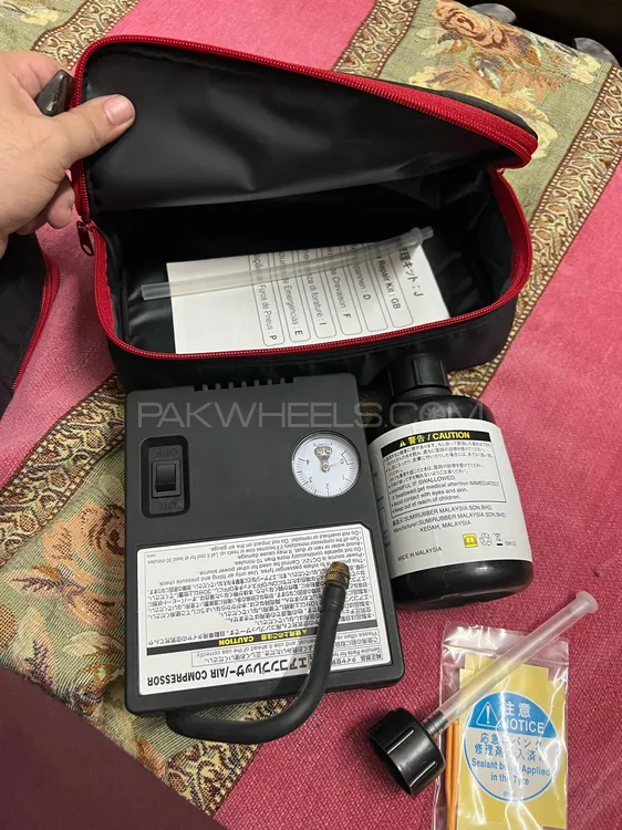Tyre Air Compressor, sealant & Repair Kit Japanese Image-1