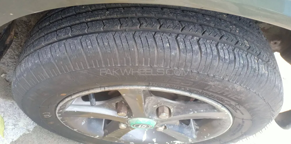 Daihatsu Cuore 2011 for Sale in Wah cantt Image-1