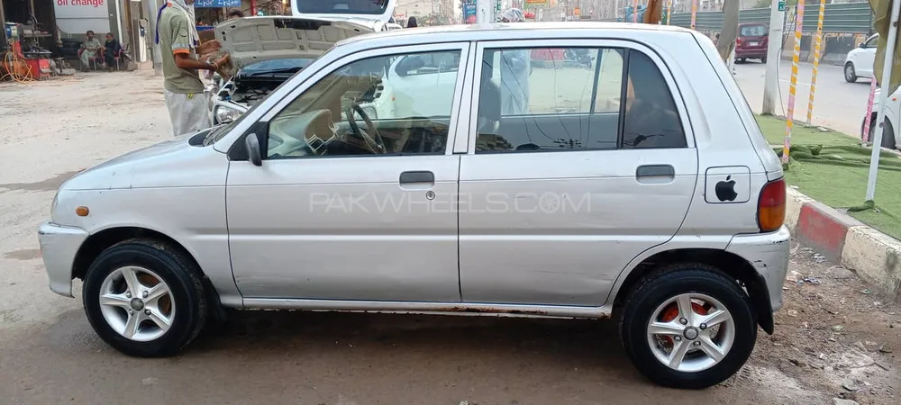 Daihatsu Cuore 2011 for Sale in Karachi Image-1