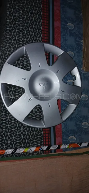 Mitsubishi Lancer Geniune Wheel Caps Image-1