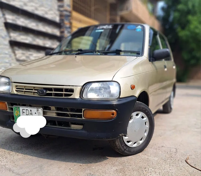 Daihatsu Cuore 2010 for Sale in Faisalabad Image-1