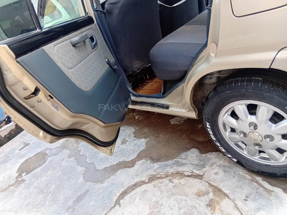 Daihatsu Cuore 2012 for Sale in Peshawar Image-1