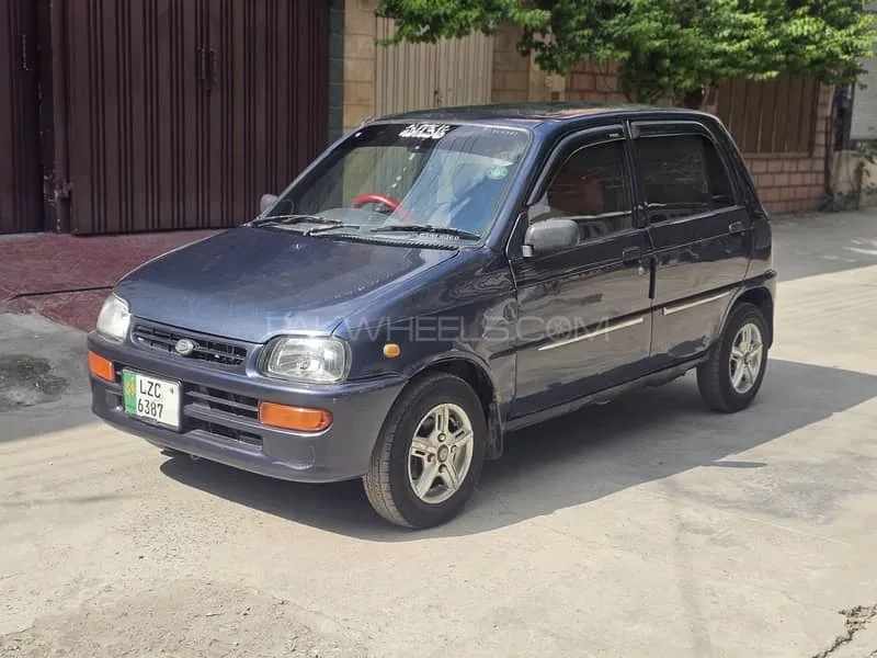 Daihatsu Cuore 2004 for Sale in Faisalabad Image-1