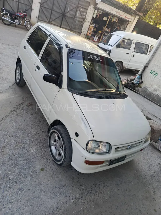 Daihatsu Cuore 2004 for Sale in Abbottabad Daihatsu Cuore 2004 for Sale in Abbottabad Image-8