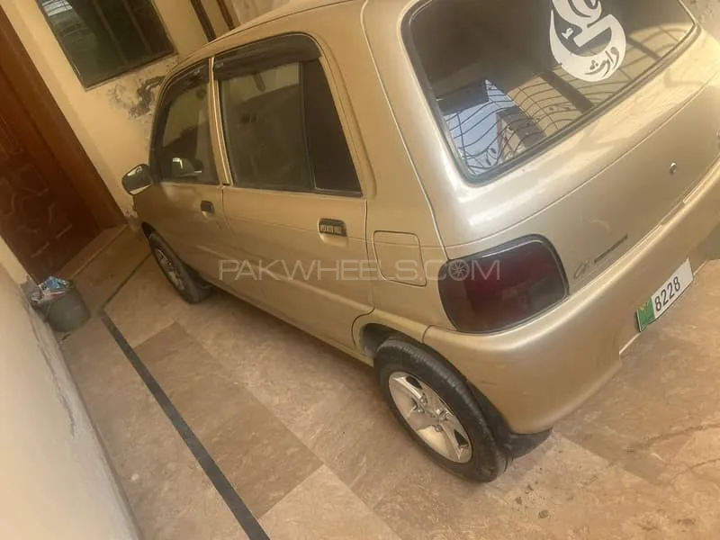 Daihatsu Cuore 2012 for Sale in Lahore Daihatsu Cuore 2012 for Sale in Lahore Image-9