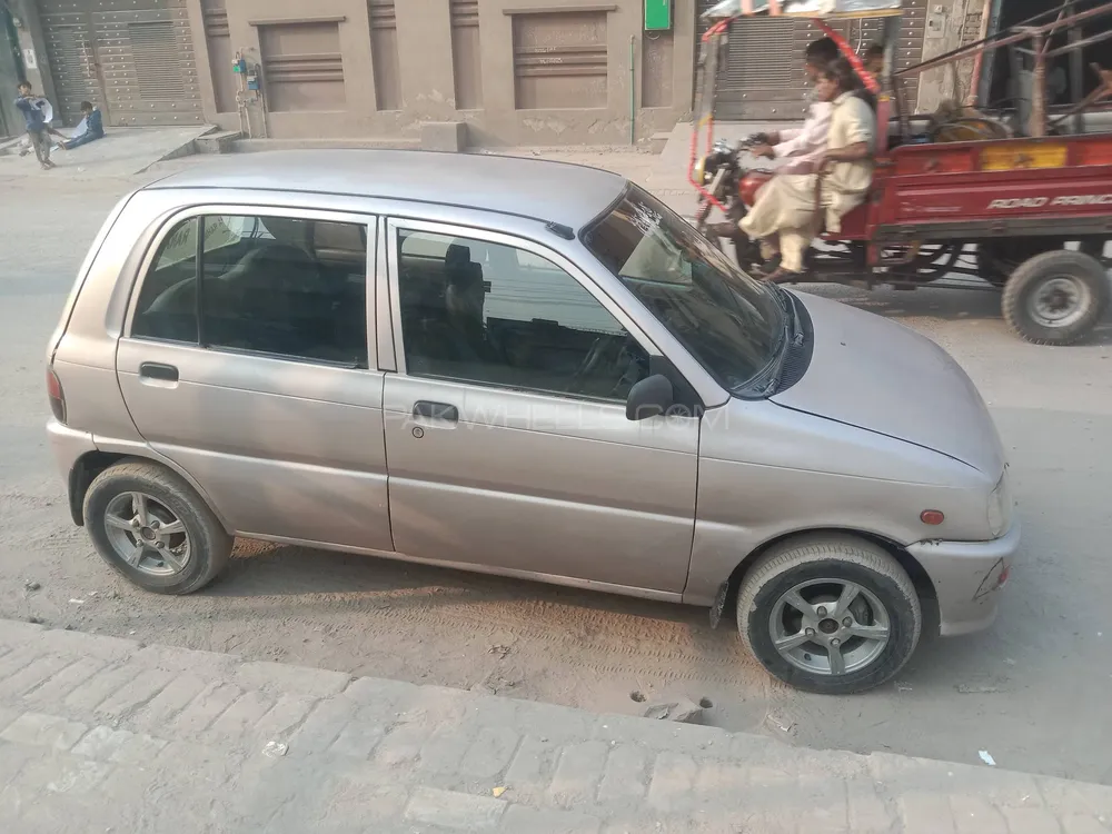 Daihatsu Cuore 2004 for Sale in Lahore Daihatsu Cuore 2004 for Sale in Lahore Image-2