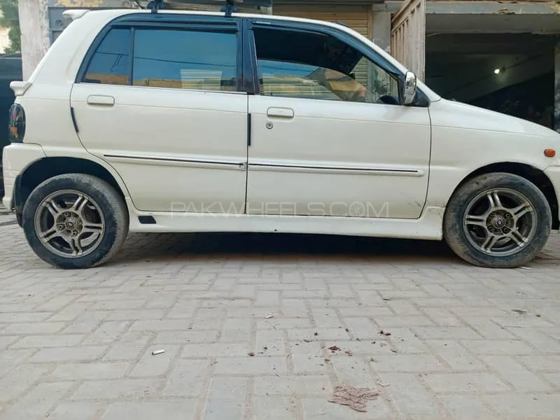 Daihatsu Cuore 2004 for Sale in Karachi Image-1