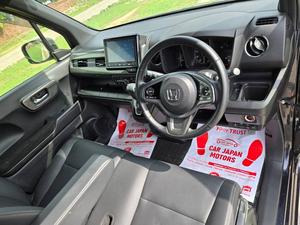 Fresh Import 2025 
Custom L Turbo Package
Model: 2023
Low Mileage: 14170 KM
Shiny Blue Colour
15 Inch Alloy Wheels  
Leather steering Wheel 
Remote Keyless Entry
No.1 Japan Quality
Custom Edition
Adaptive Cruise Control
Push Start Engine
Fully Automatic Air Conditioner
Navigation System
Back Camera
Led Headlights
Auto Brake Hold Function
Heated Seats
Engine In Clean & Good Condition
No.1 Japan Quality
All Power Windows
Led Sequential Turn Signal Lamps (Front) &
Full Led Rear Combination Lamps
Eco Idle Technology
Runs & Drives Great
Clean Interior & Exterior
Power Steering
Rear Wiper
Immobilizer
Sofa Seats
Winker Mirror
Retract Mirrors
According To Honda Motor Corporation Japan 29.4 Km/l
Glass With Ultra-violet Filter
Steering: Power Assist Equipped Rack & Pinion
8 SRS Air Bag
Traction Control
High Quality Luxury Hatchback
Brand New Tyres
Anti-lock Brakes
Passenger Airbag
Fully Loaded