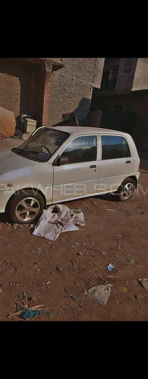 Daihatsu Cuore 2004 for Sale in Lahore Daihatsu Cuore 2004 for Sale in Lahore Image-2