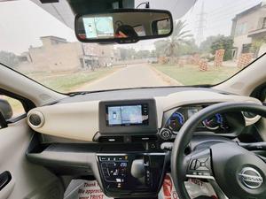 Fresh Import 2025
No.1 Japan Quality
X EDITION 
2023 Model
Low Mileage: 22677 KM
Shiny Brown Colour
15 INCHES NEW DESIGN ALLOY WHEELS 
Heating Seats 
Push Start Engine / Intelligent Key
Auto Ac Touch Panel
LED  Head Lump
Super UV Cut Doors Glass
Intelligent Around View Monitor
Camera On Room Mirror
Genuine Verifiable Auction Sheet
Alloy Wheels
Nissan Genuine 9 Inch Navigation System
Nissan Genuine Back Camera
Remote Door Mirror
Abs Braking System
Traction Control
Hid Headlights
Auction Sheet Attach For Satisfaction And Online Verification
Retractable Side Mirrors With Indicators
Winker Mirror
Digital Climate Control Air Conditioning System
6 Air Bags 
All Power Windows
Multimedia Steering
Engine In Clean & Good Condition
Clean Interior & Exterior
Power Steering
High Quality Luxury Hatchback
Brand New Tyres