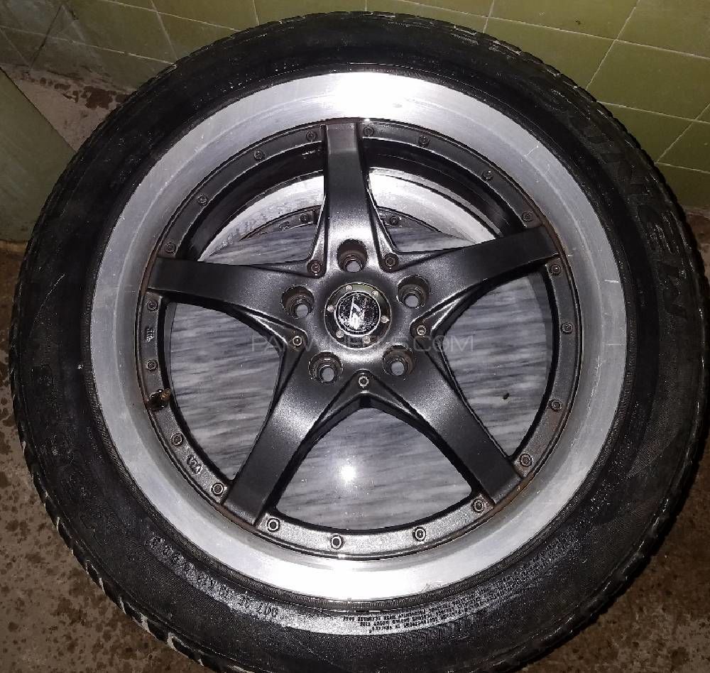 17 size alloy 4 rims with 2 low profile tyres Image-1