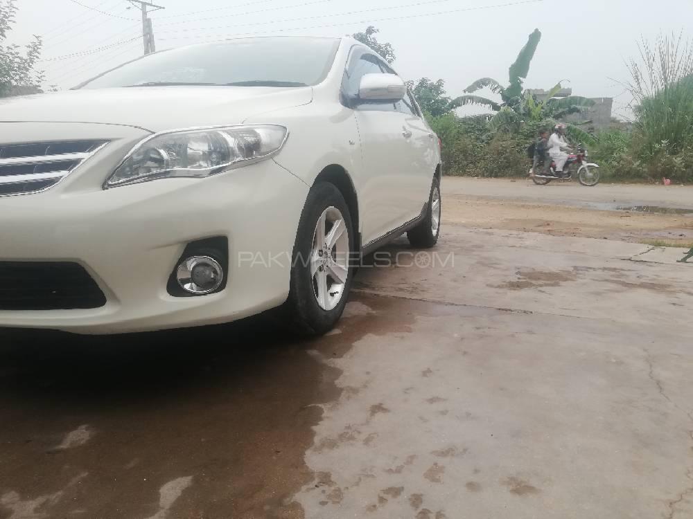 Toyota Corolla 2014 for Sale in Mandi bahauddin Toyota Corolla 2014 for Sale in Mandi bahauddin Image-4