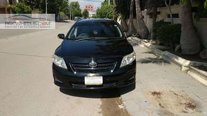 Slide_toyota-corolla-xli-vvti-2011-32977078