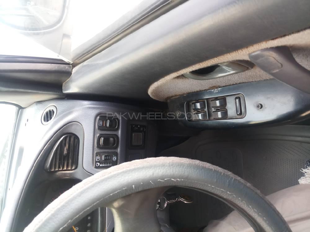 Daihatsu Cuore 2003 for Sale in Peshawar Daihatsu Cuore 2003 for Sale in Peshawar Image-8