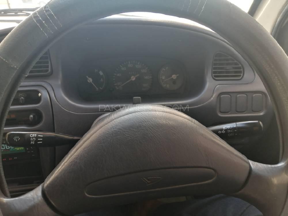 Daihatsu Cuore 2006 for Sale in Mansehra Daihatsu Cuore 2006 for Sale in Mansehra Image-12